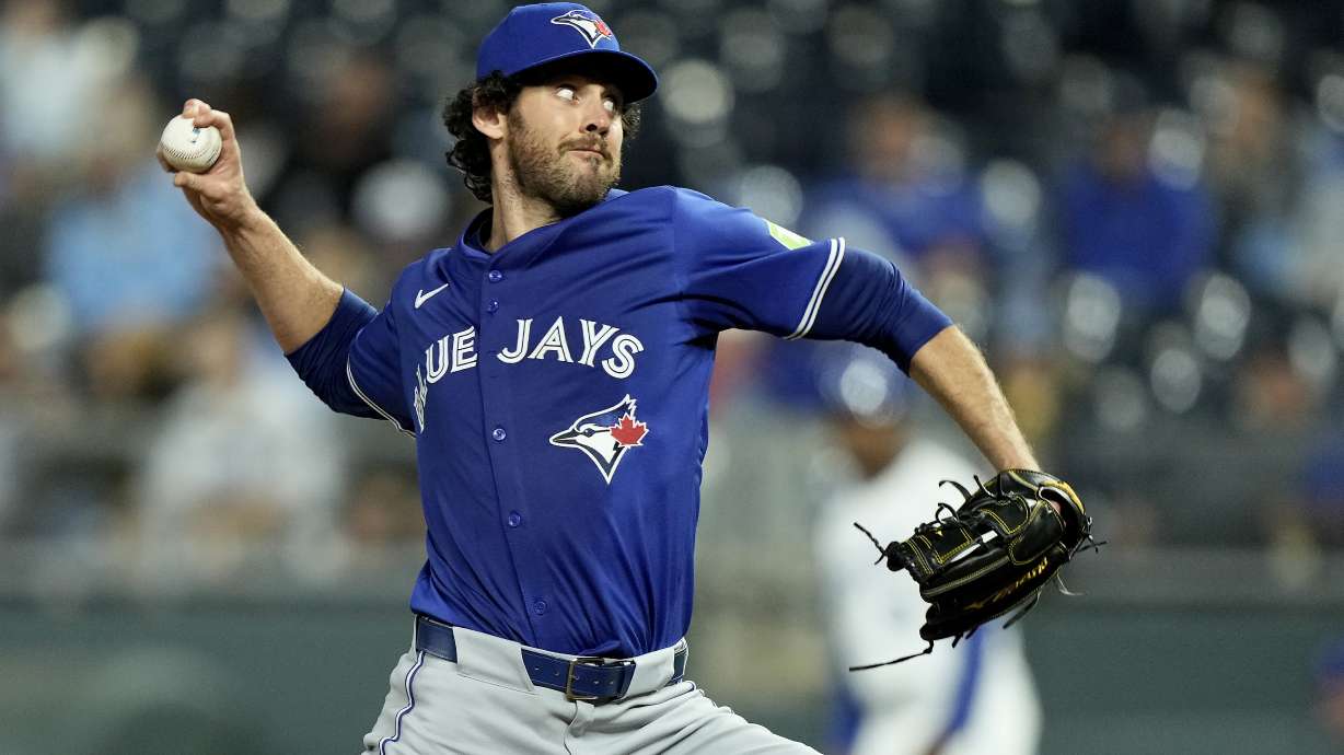 FILE - Toronto Blue Jays relief pitcher Jordan Romano throws during the ninth inning of a baseball game against the Kansas City Royals, April 22, 2024, in Kansas City, Mo.