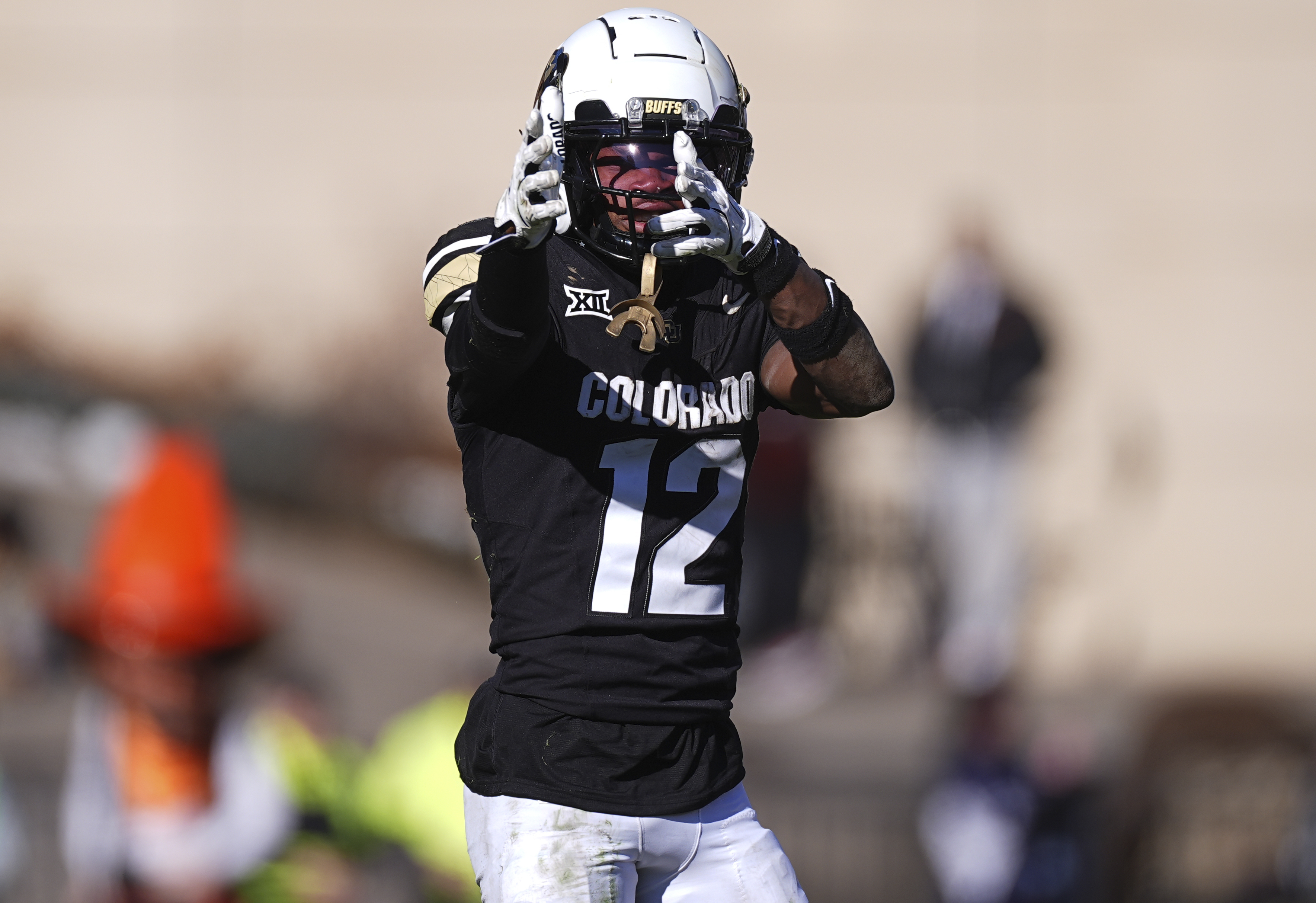 Colorado wide receiver Travis Hunter gestures after pulling in a pass for a first down in the second half of an NCAA college football game against Oklahoma State, Friday, Nov. 29, 2024, in Boulder, Colo.