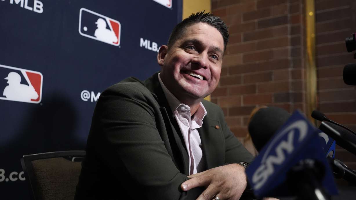 New York Mets manager Carlos Mendoza smiles as he speaks to media at the Major League Baseball winter meetings, Monday, Dec. 9, 2024, in Dallas.