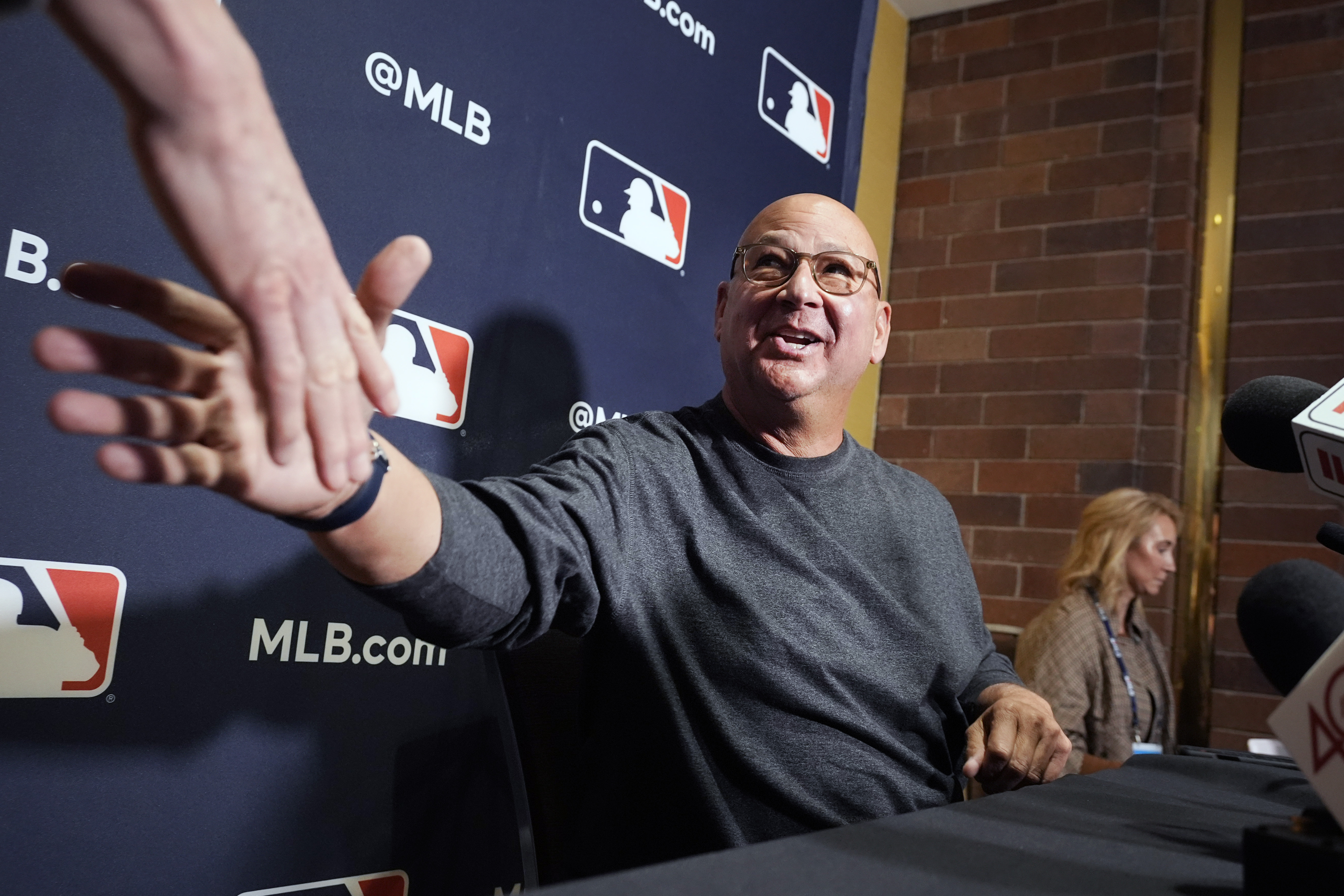 CORRECTS TEAM TO CINCINNATI REDS NOT CLEVELAND GUARDIANS AND SPELLING TO FRANCONA NOT RRANCONA - Cincinnati Reds manager Terry Francona shakes hands at the Major League Baseball winter meetings, Monday, Dec. 9, 2024, in Dallas.