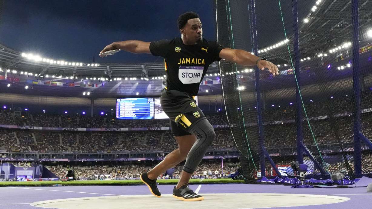 FILE - Roje Stona, of Jamaica, competes in the men's discus throw final at the 2024 Summer Olympics, Wednesday, Aug. 7, 2024, in Saint-Denis, France.
