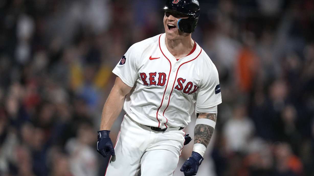 FILE - Boston Red Sox's Tyler O'Neill celebrates after his game-winning three-run home run in the bottom of the 10th inning of a baseball game against the Baltimore Orioles at Fenway Park, Wednesday, Sept. 11, 2024, in Boston.