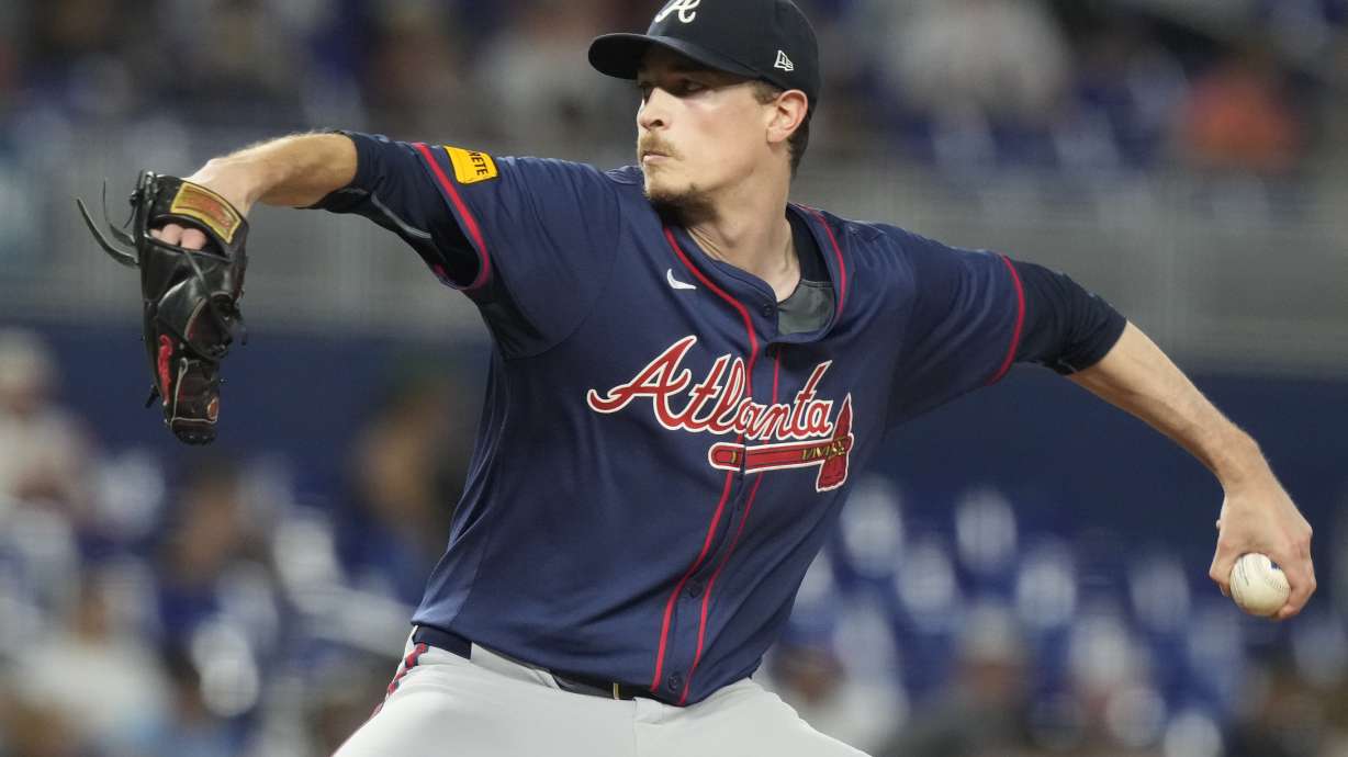FILE - Atlanta Braves starting pitcher Max Fried aims a pitch during the third inning of a baseball game against the Miami Marlins, Saturday, Sept. 21, 2024, in Miami.