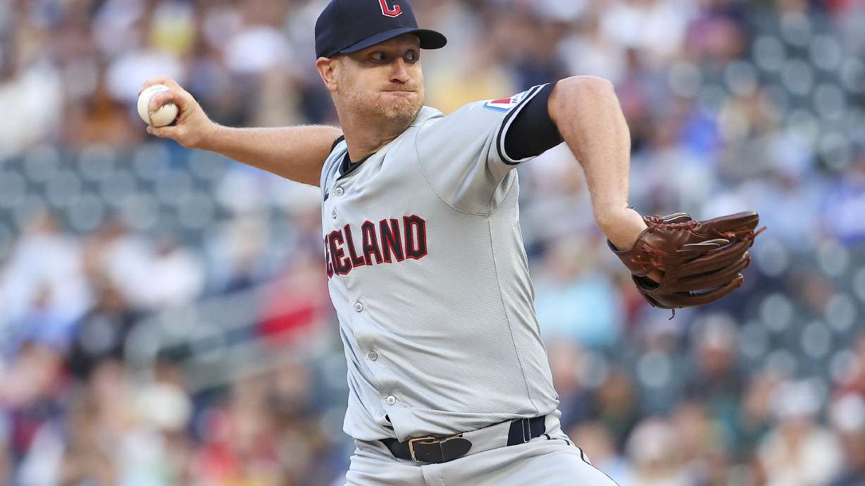 FILE - Cleveland Guardians starting pitcher Alex Cobb delivers against the Minnesota Twins during the first inning of the second game of a baseball doubleheader, Aug. 9, 2024, in Minneapolis.
