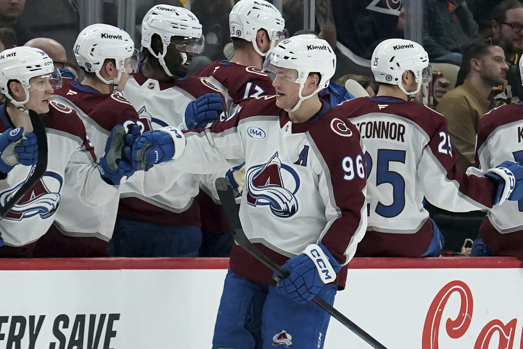 Colorado Avalanche's Mikko Rantanen (96) returns to the bench after scoring during the second period of an NHL hockey game against the Pittsburgh Penguins Tuesday, Dec. 10, 2024, in Pittsburgh.