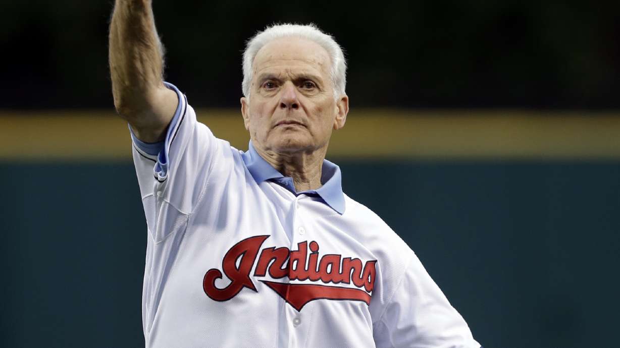 FILE - Cleveland Indians Hall of Famer Rocky Colavito throws out the ceremonial first pitch before the Indians played the Los Angeles Angels in a baseball game, Aug. 10, 2013, in Cleveland.