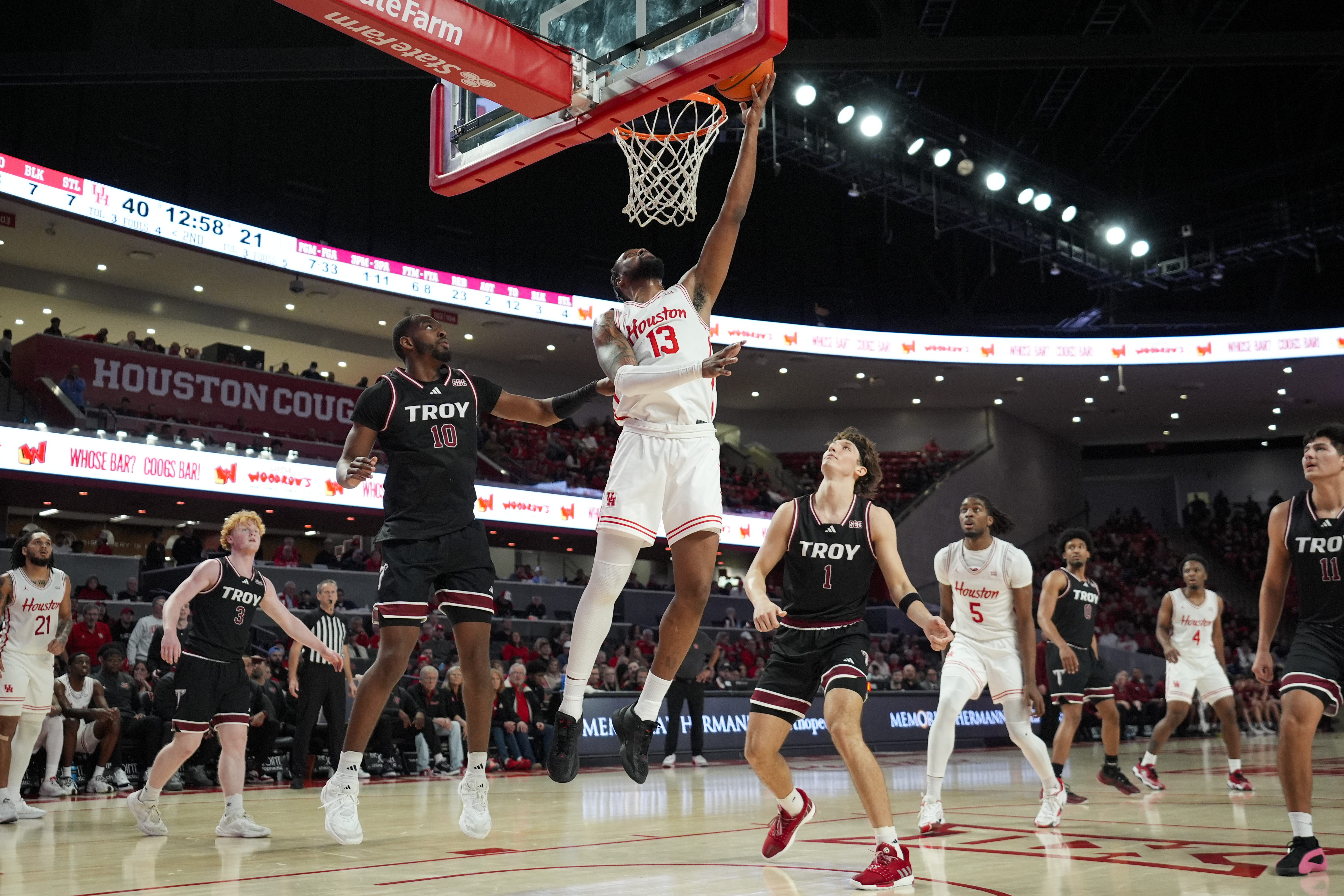 Cryer scores 22 points and No. 15 Houston defeats Troy 62-42