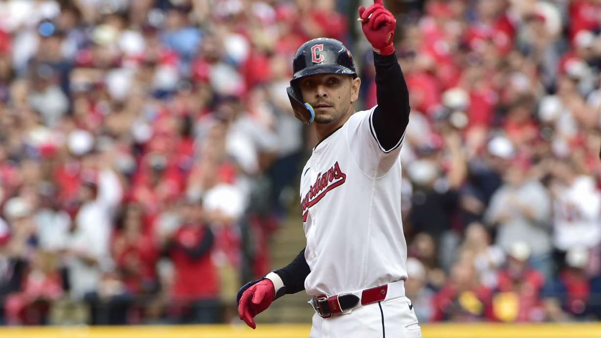 FILE - Cleveland Guardians' Andres Gimenez gestures after hitting a double in the eighth inning during Game 5 of baseball's American League Division Series against the Detroit Tigers, Oct. 12, 2024, in Cleveland.