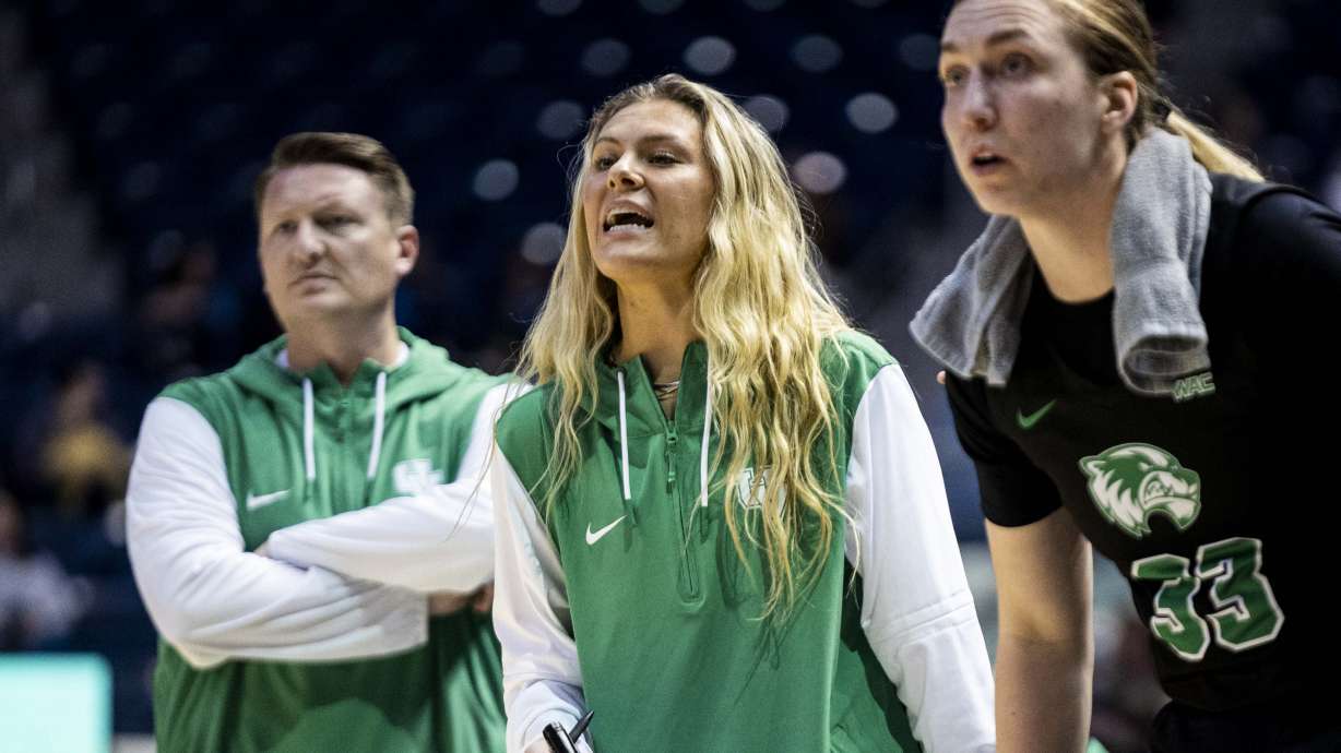 Utah Valley assistant coach Paisley Johnson-Harding calls out to players during an NCAA women’s basketball game between the Brigham Young University Cougars and the UVU Wolverines held at the Marriott Center in Provo on Tuesday, Dec. 10, 2024.