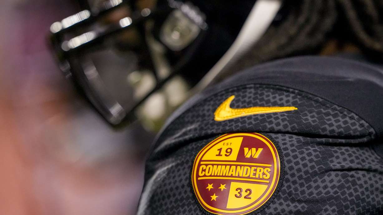 FILE - A Washington Commanders logo and a Nike logo are seen on a player's uniform before an NFL football game against the Chicago Bears, Thursday, Oct. 5, 2023, in Landover, Md.