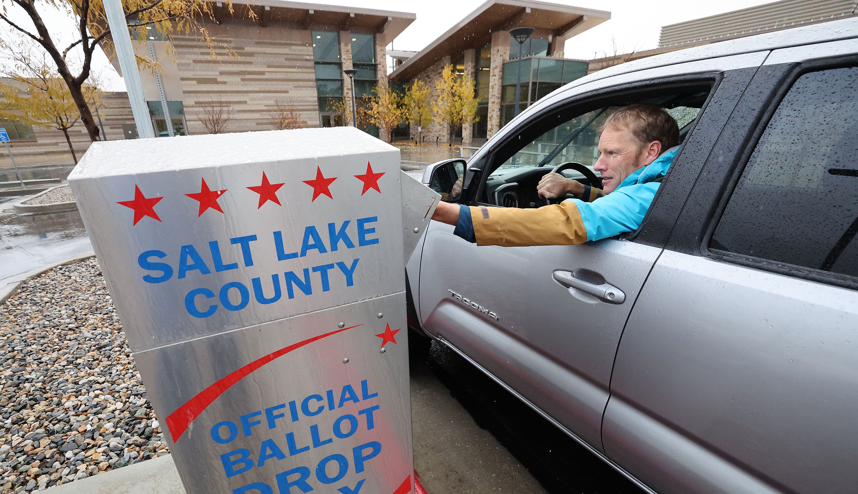 Guy Evans casts his mail in ballot in Cottonwood Heights on Nov. 8, 2022. Utah House Speaker Mike Schultz is questioning the future of Utah's vote by mail system.