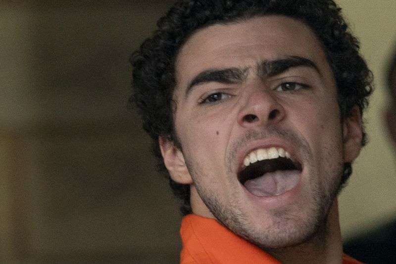 Suspect Luigi Mangione is taken into the Blair County Courthouse on Tuesday in Hollidaysburg, Pa.