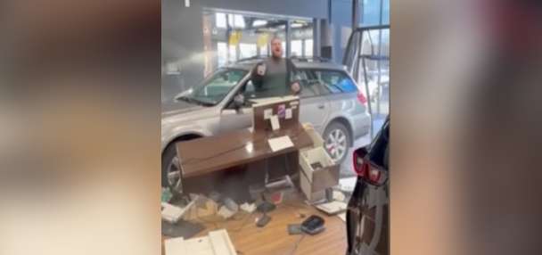 Man says he drove car through showroom doors out of 'sadness and rage'