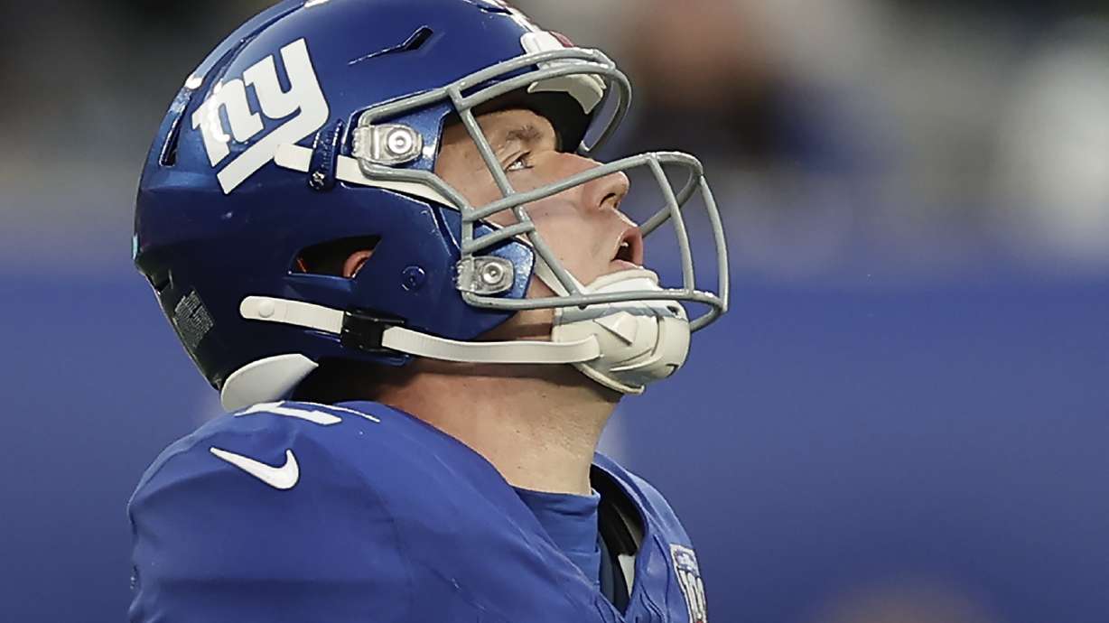 New York Giants quarterback Drew Lock (2) reacts during the fourth quarter of an NFL football game against the New Orleans Saints, Sunday, Dec. 8, 2024, in East Rutherford, N.J.