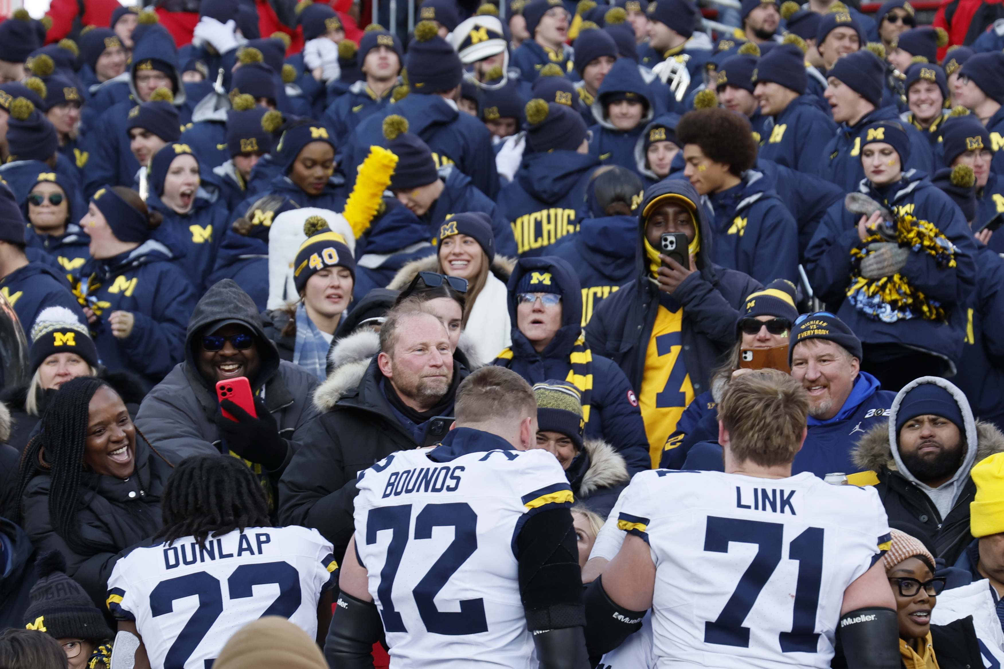 Michigan players celebrate their win over Ohio State in an NCAA college football game Saturday, Nov. 30, 2024, in Columbus, Ohio.