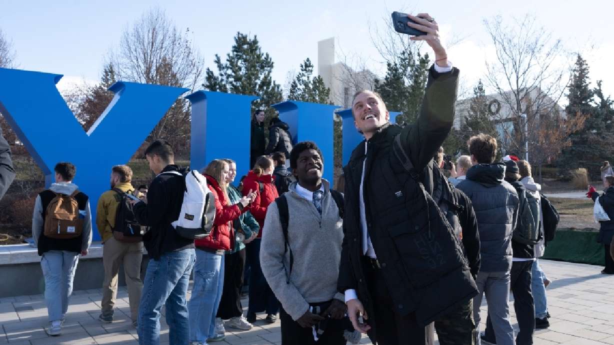 BYU-Idaho students celebrate together at the new BYU-I landmark on Tuesday in Rexburg, Idaho.