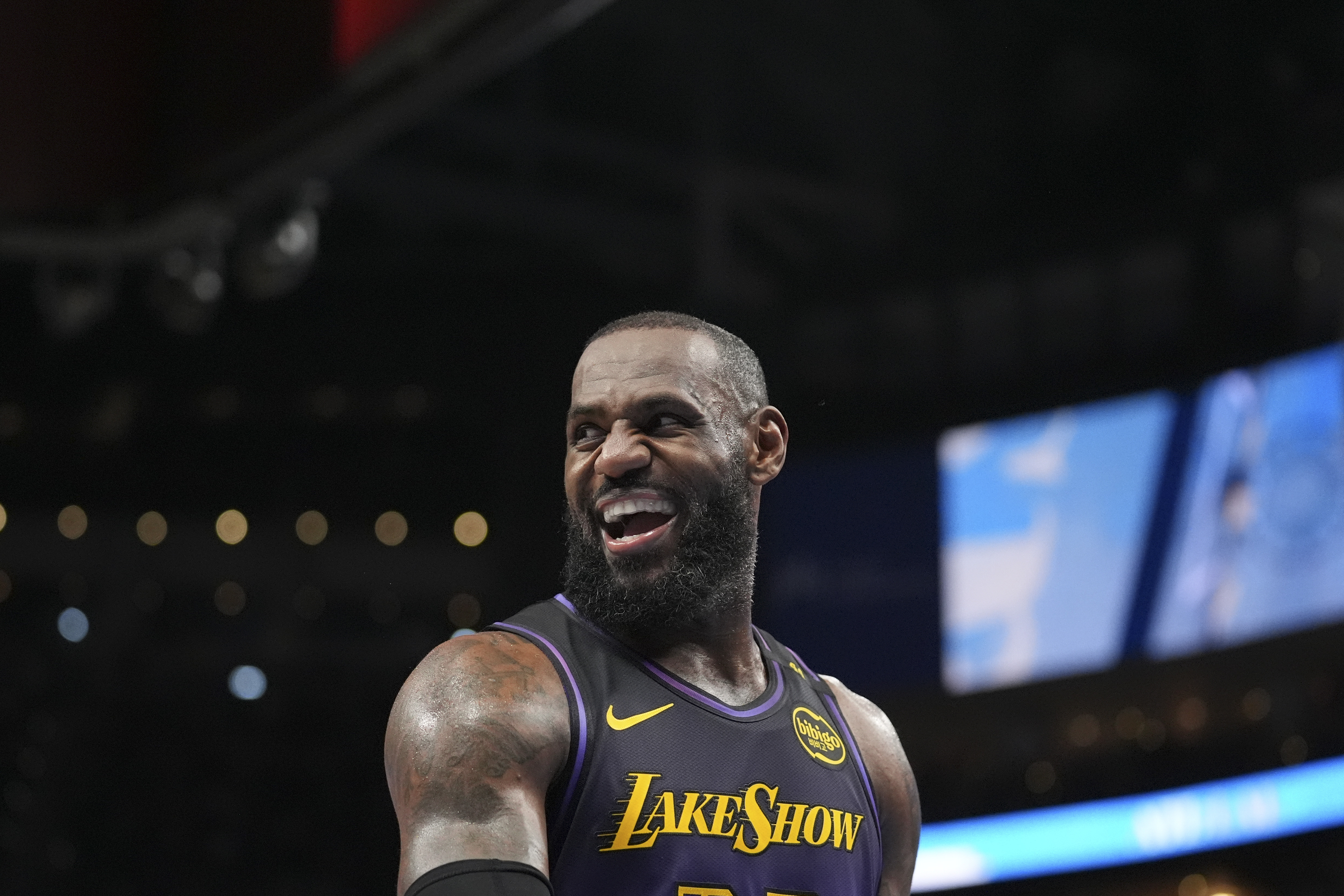 LeBron James is excused from Lakers' practice and status for next game is unclear amid foot injury