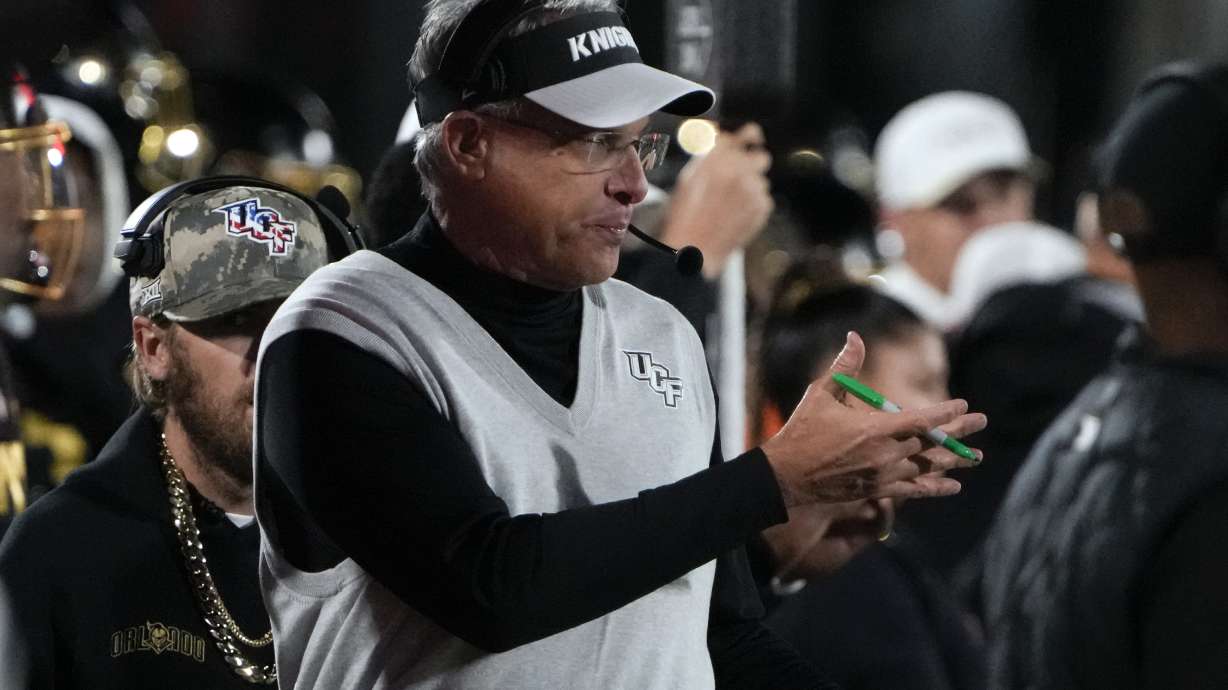 Central Florida head coach Gus Malzahn directs his team during the second half of an NCAA college football game against Utah, Friday, Nov. 29, 2024, in Orlando, Fla.
