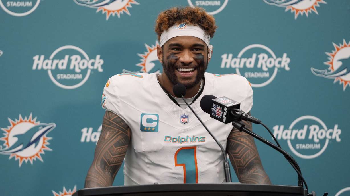 Miami Dolphins quarterback Tua Tagovailoa (1) speaks during a news conference following an NFL football game against the New York Jets, Sunday, Dec. 8, 2024, in Miami Gardens, Fla.