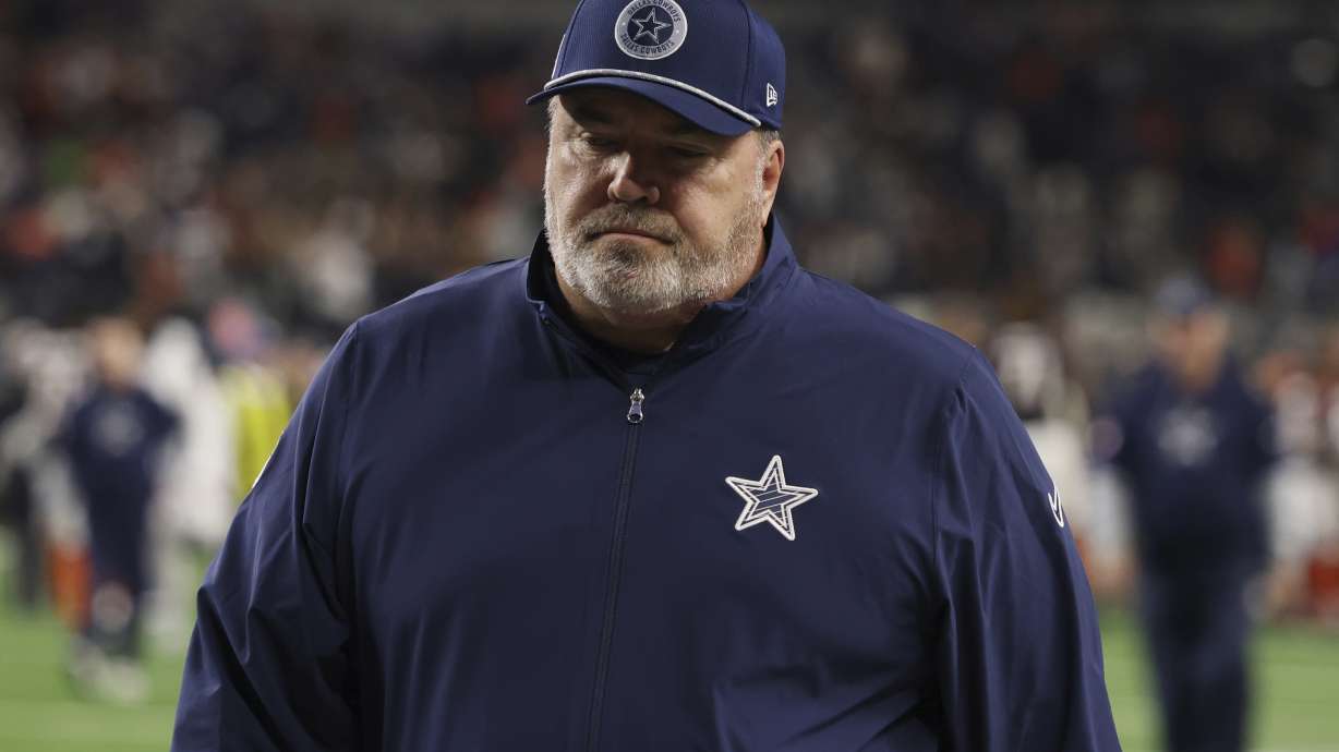 Dallas Cowboys head coach Mike McCarthy walks from the field after an NFL football game against the Dallas Cowboys, Monday, Dec. 9, 2024, in Arlington, Texas. The Cincinnati Bengals won 27-20.