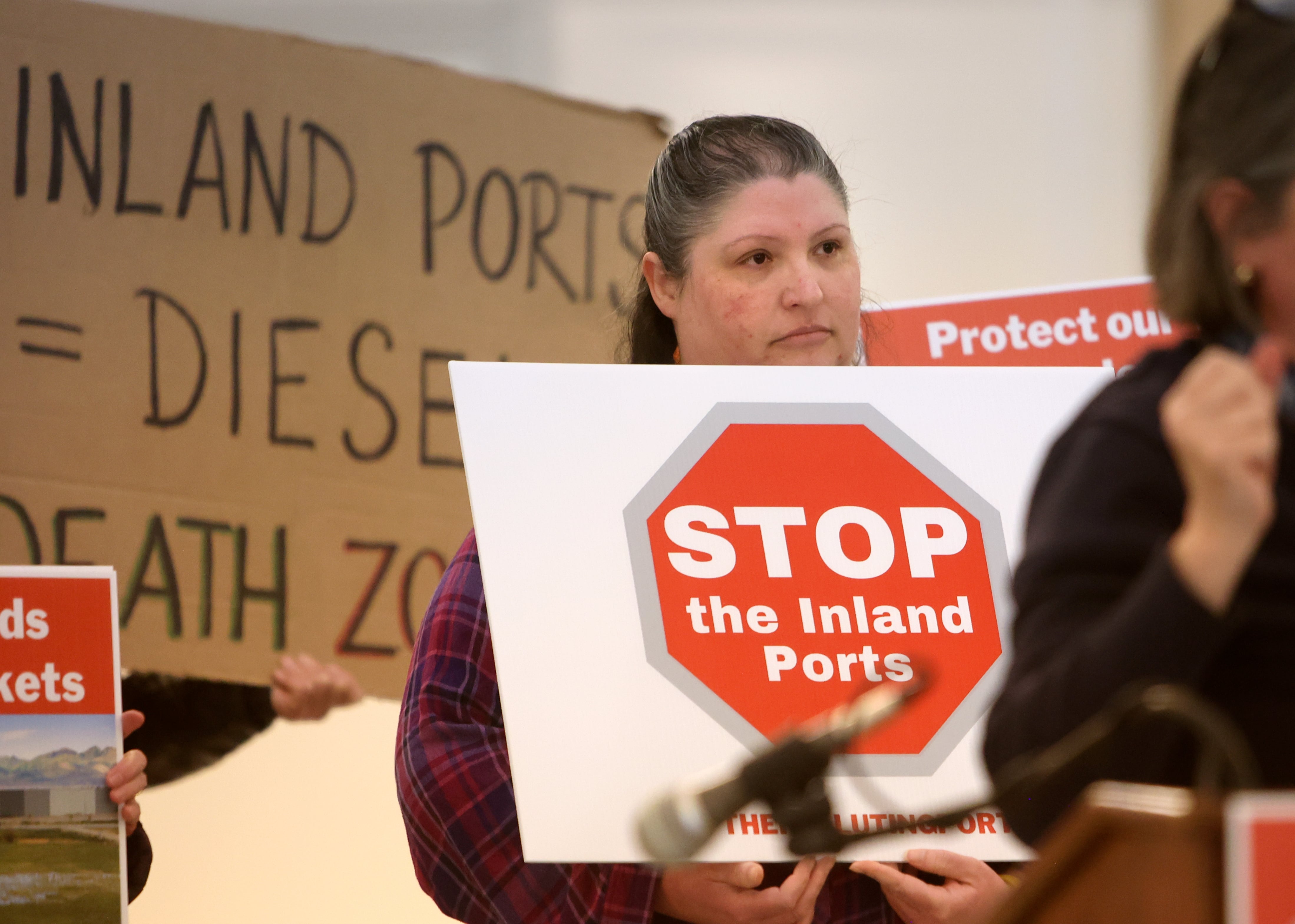 Teri Durfee, a lifelong Tooele County resident, attends a press conference urging the halt to Utah Inland Port Authority development in Great Salt Lake wetlands at the capitol in Salt Lake City on Wednesday.