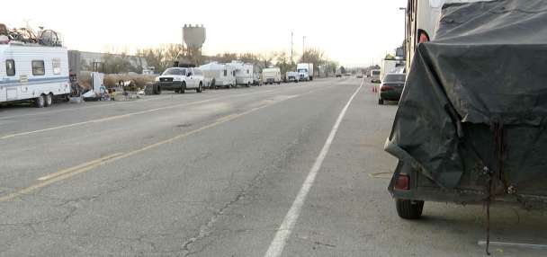 Gunman arrested, accused of robbing people in Salt Lake RV