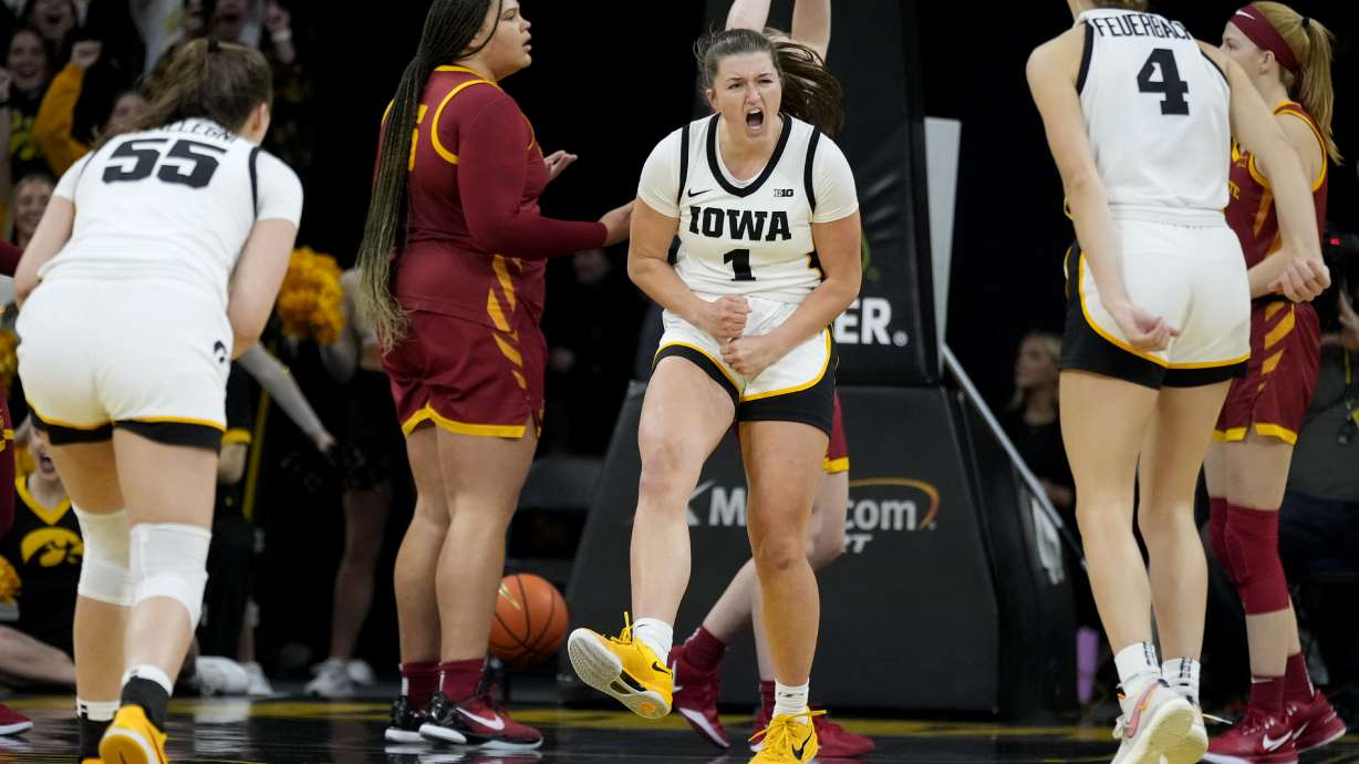 Iowa guard Taylor Stremlow (1) celebrates after making a basket during the first half of an NCAA college basketball game against Iowa State, Wednesday, Dec. 11, 2024, in Iowa City, Iowa.