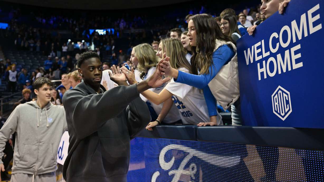 AJ Dybantsa, the nation's No. 1 basketball recruit, joins the Cougars after the game to greet fans after BYU and Fresno State played at the Marriott Center in Provo on Wednesday, Dec. 11, 2024.