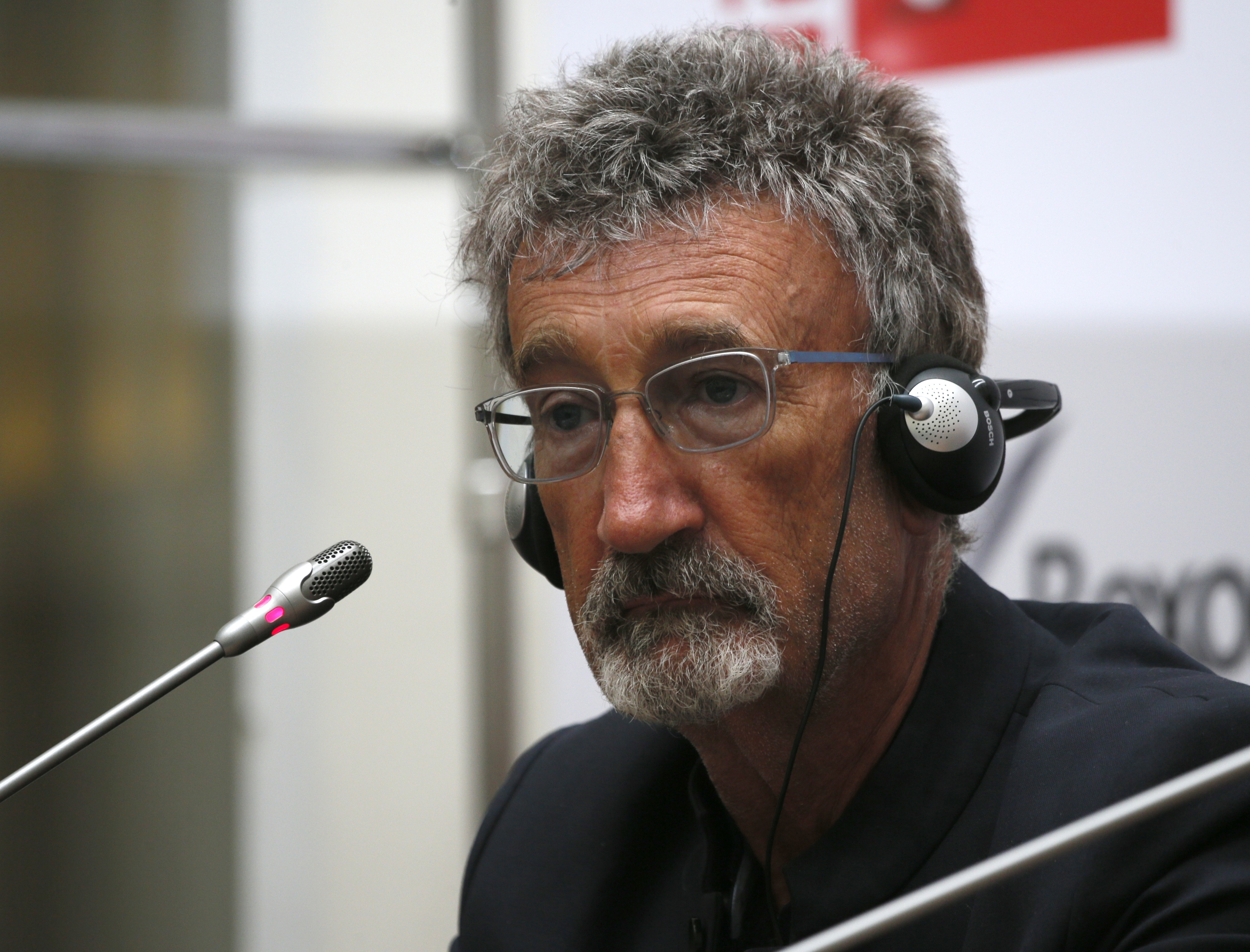 FILE - Eddie Jordan, former Formula One driver and team owner, listens during a press conference during a Moscow City Racing 2013 along the Moscow Kremlin, in Moscow, Russia, Sunday, July 21, 2013.