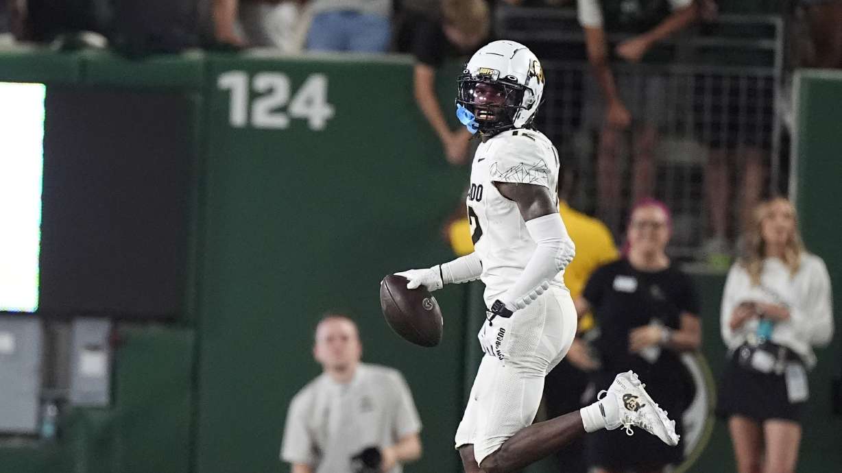 Colorado wide receiver Travis Hunter celebrates after intercepting a pass from Colorado State quarterback Brayden Fowler-Nicolosi in the second half of an NCAA college football game Saturday, Sept. 14, 2024, in Fort Collins, Colo.