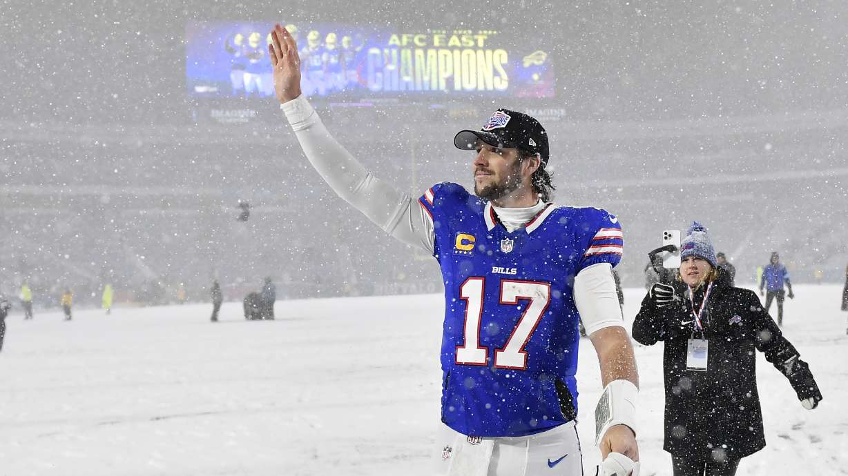 Buffalo Bills quarterback Josh Allen (17) gestures toward fans as he walks off the field after an NFL football game against the San Francisco 49ers in Orchard Park, N.Y., Sunday, Dec. 1, 2024.
