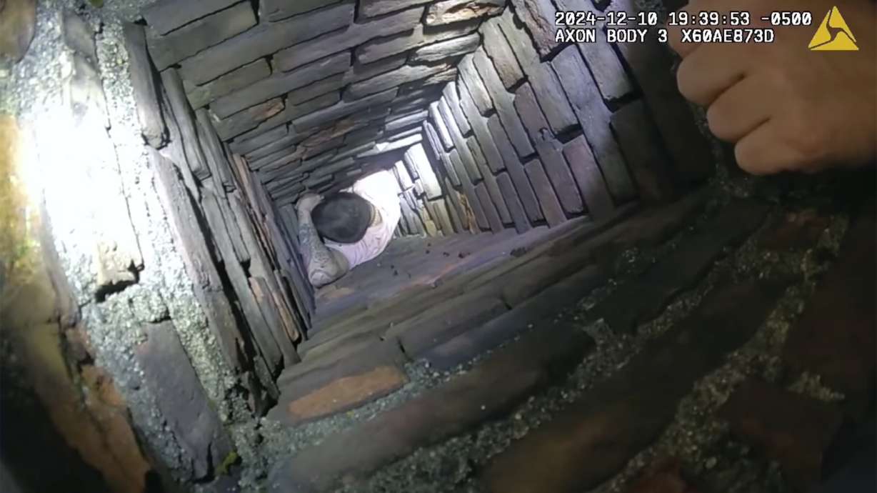 Fall River police encounter a man allegedly attempting to evade arrest by hiding inside a chimney on Tuesday.