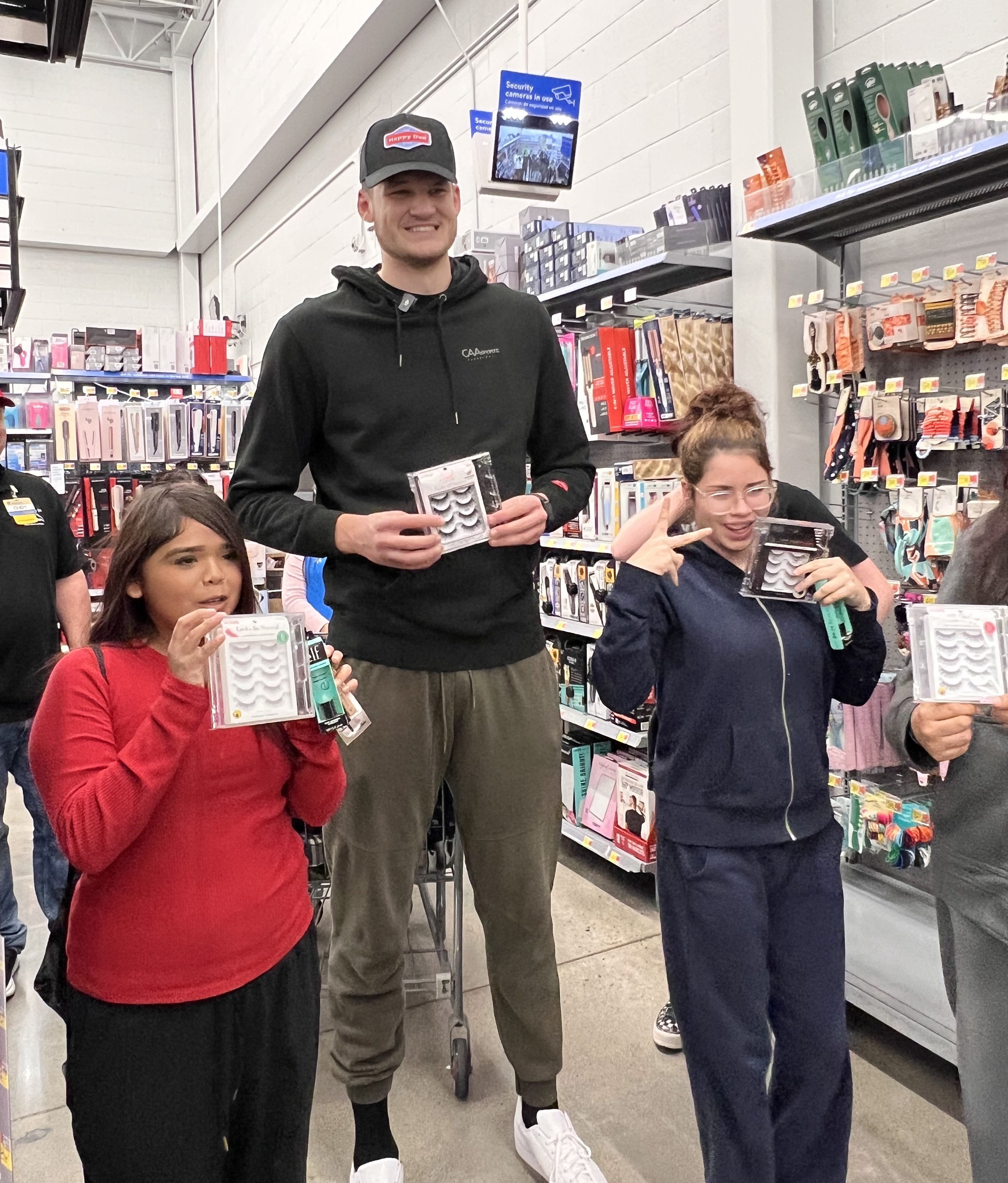 Walker Kessler shops with members of a local Boys and Girls Club.