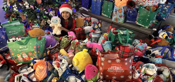 7-year-old from Kearns celebrates by receiving and giving