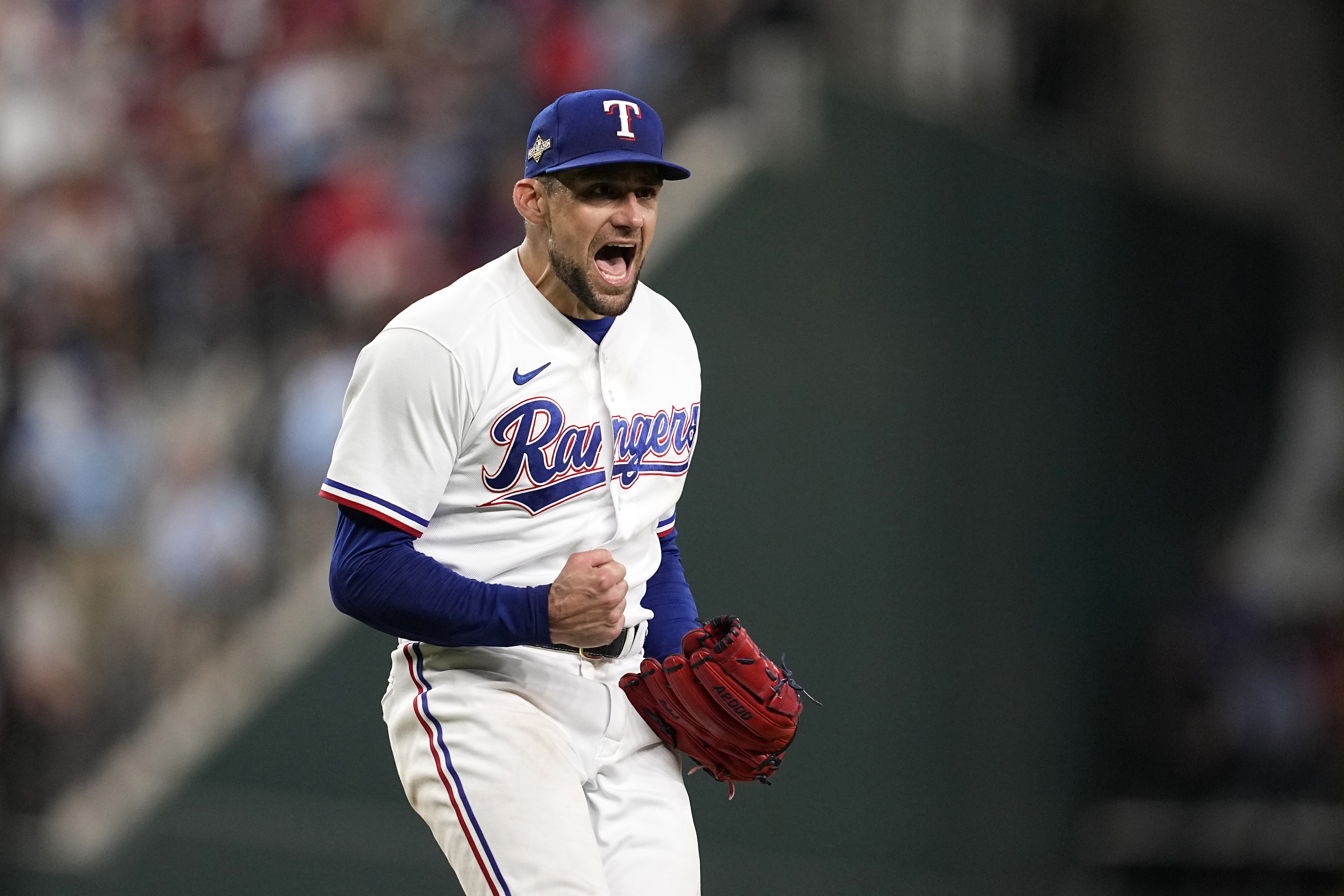 FILE - In this Oct. 10, 2023, photo, Texas Rangers starting pitcher Nathan Eovaldi celebrates on the mound after getting an out against the Baltimore Orioles in Game 3 of an American League Division Series baseball game in Arlington, Texas.