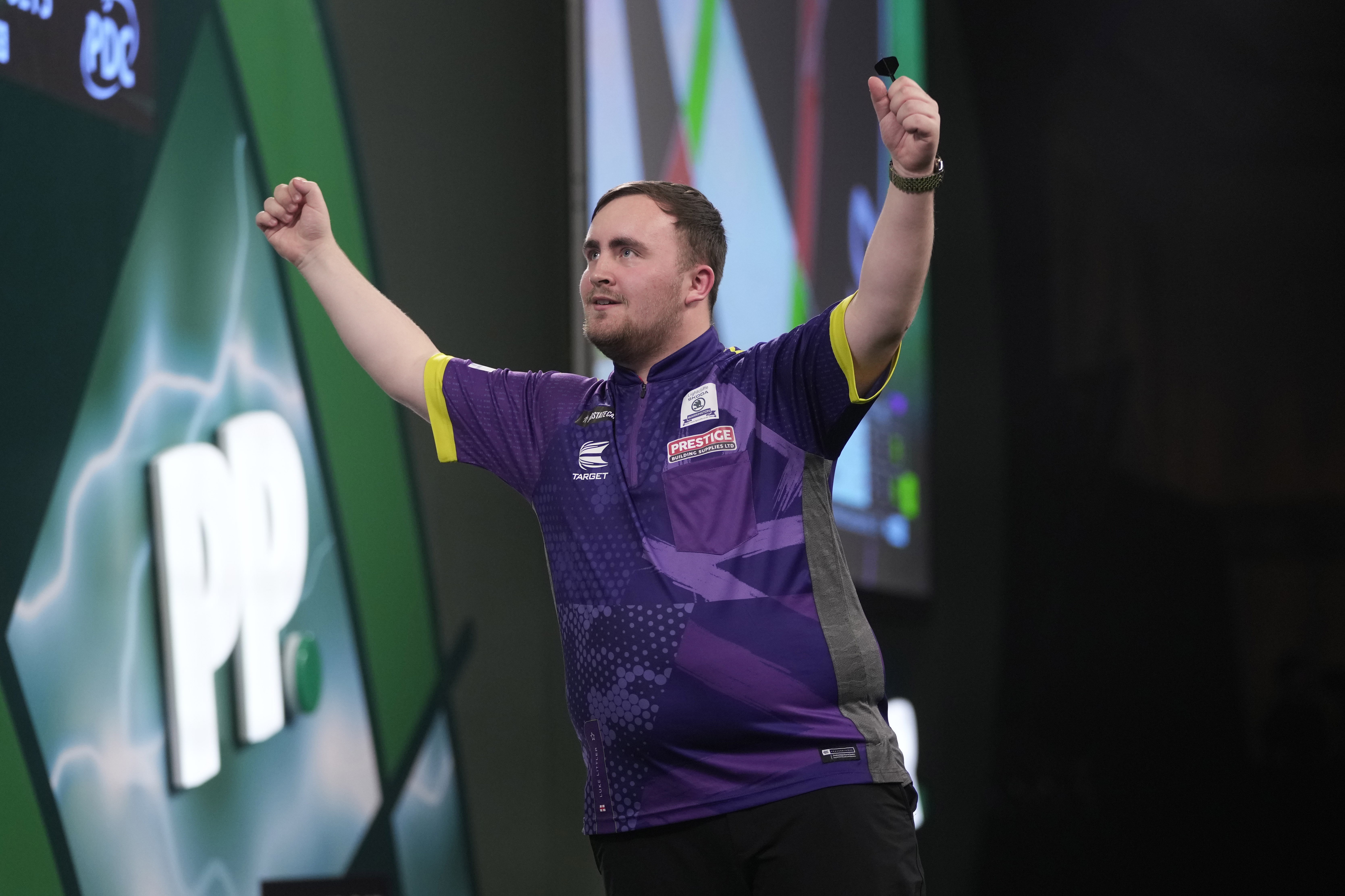 FILE - Luke Littler of England celebrate after winning the semifinal match against Scott Williams of England at the World Darts Championship, in London, Tuesday, Jan. 2, 2024.