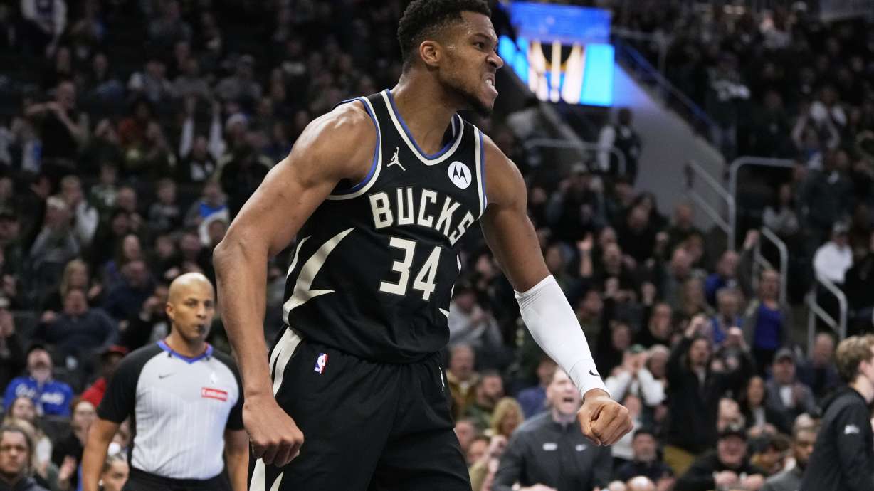 Milwaukee Bucks' Giannis Antetokounmpo reacts after a dunk during the second half of an Emirates NBA cup tournament quarterfinals basketball game against the Orlando Magic Tuesday, Dec. 10, 2024, in Milwaukee.