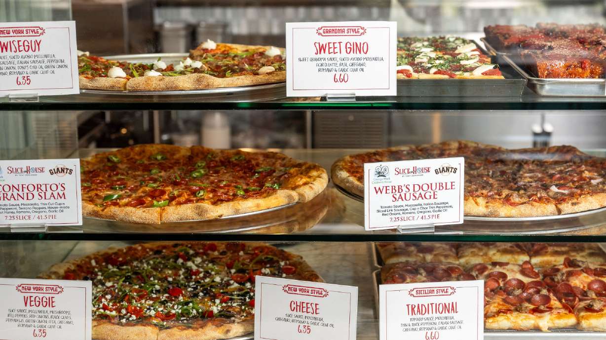 Pizza displayed at a Slice House by Tony Gemignani. The pizza chain, founded by the 13-time world pizza champion, opens on Saturday. Bobby's Burgers by Bobby Flay, another celebrity chef-backed chain, opened in Orem on Thursday.