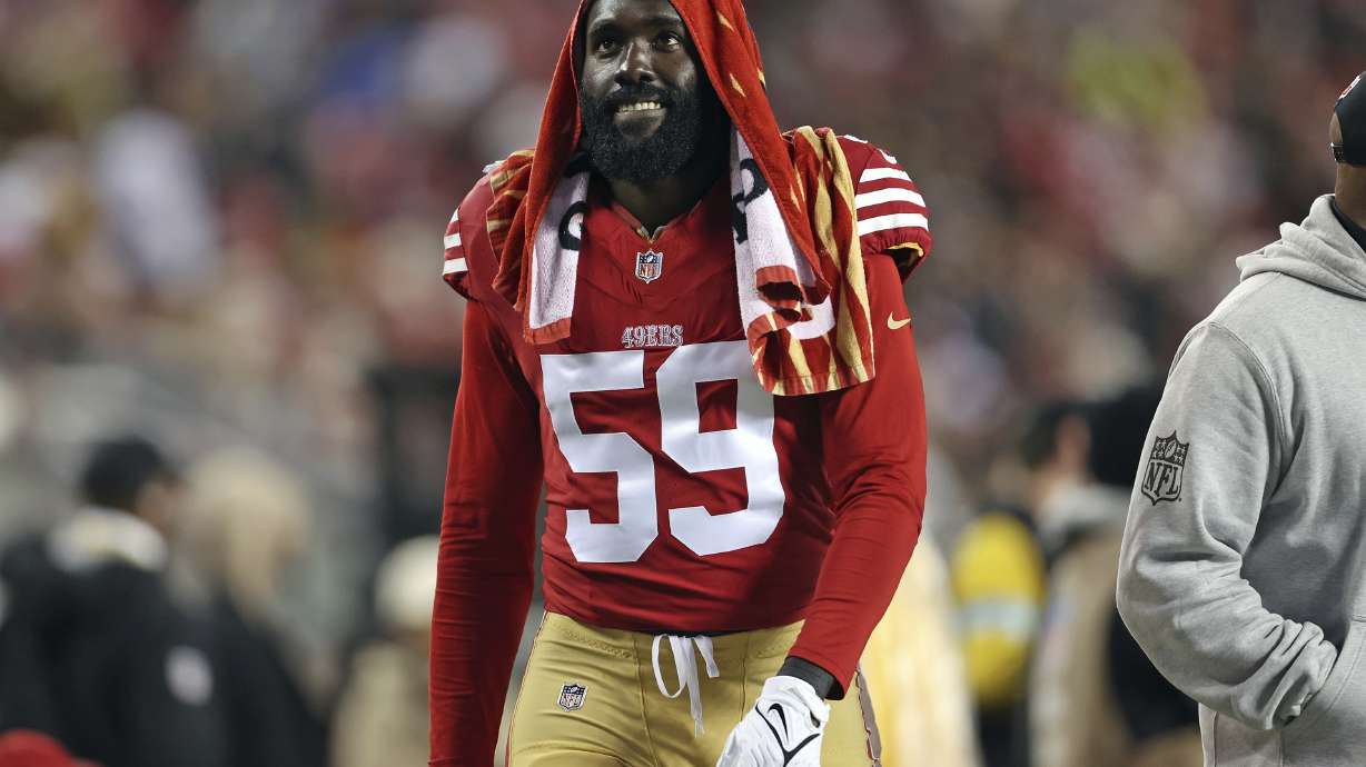 San Francisco 49ers' De'Vondre Campbell walks to the locker room during the second half of an NFL football game against the Los Angeles Rams in Santa Clara, Calif., Thursday, Dec. 12, 2024.
