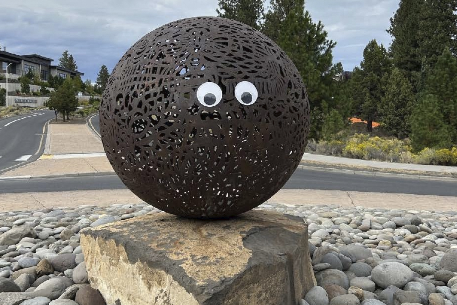 This image provided by the City of Bend, Oregon, shows a pair of googly eyes placed on a public art sculpture in Bend, Ore.