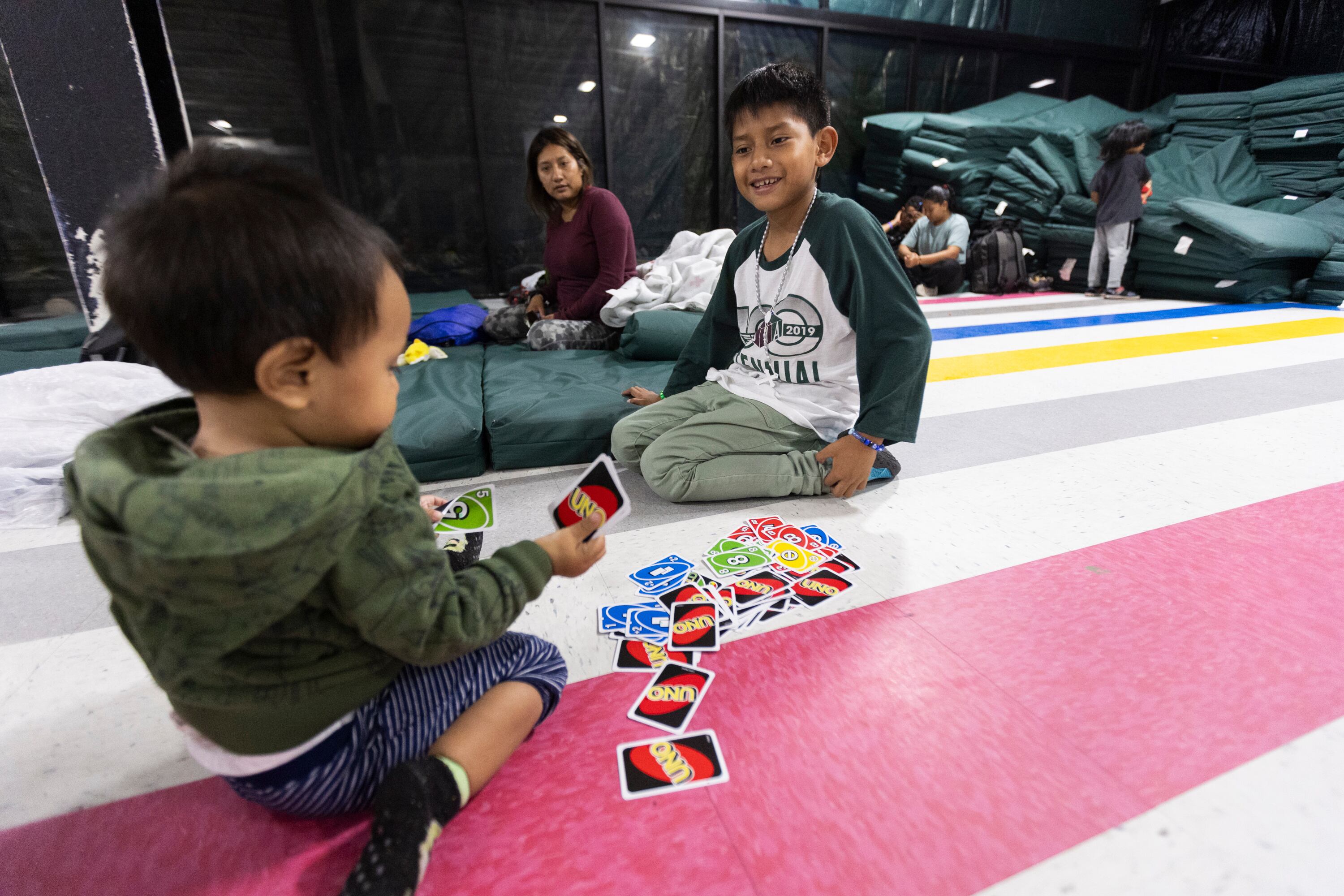 Nancy Toaquiza watches her sons Aarón and Dilan at Catholic Charities in McAllen, Texas, on June 17. A political analyst predicts what President-elect Donald Trump's election victory means and does not mean for America.