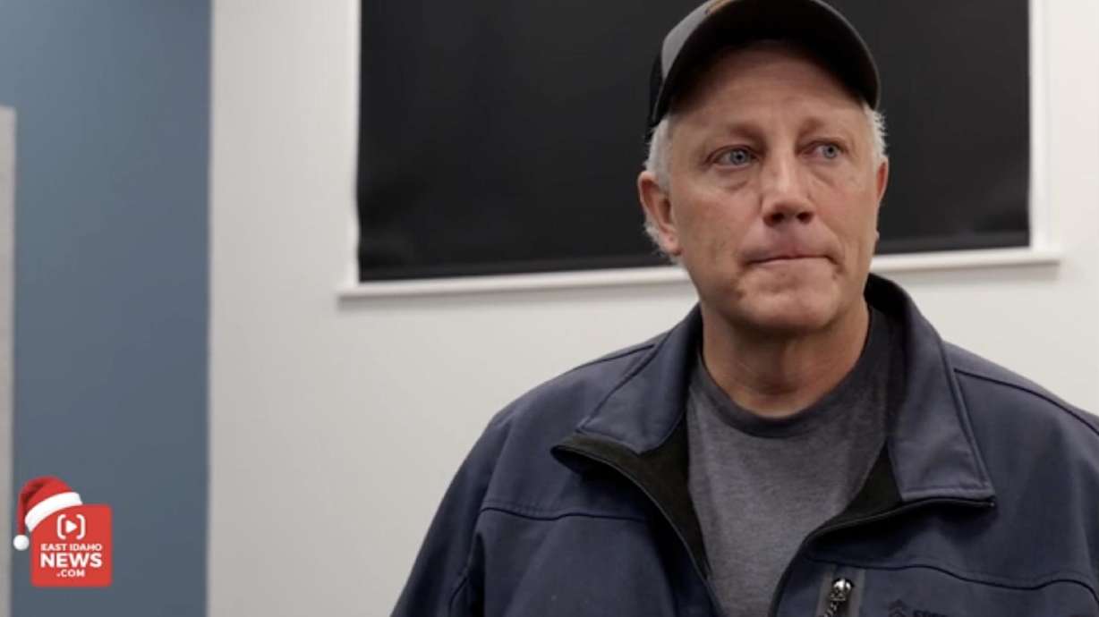 Dustin Cook reacts to receiving a Secret Santa surprise courtesy of East Idaho News.