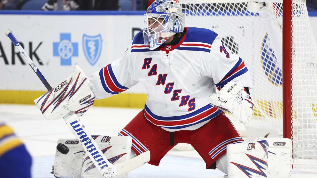 New York Rangers goaltender Igor Shesterkin (31) makes a pad save during the first period of an NHL hockey game against the Buffalo Sabres Wednesday, Dec. 11, 2024, in Buffalo, N.Y.