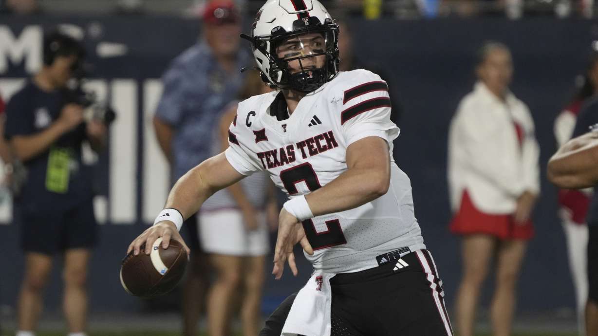 FILE - Texas Tech quarterback Behren Morton looks to pass during an NCAA football game against Arizona, in Tucson, Ariz., Oct. 5, 2024,