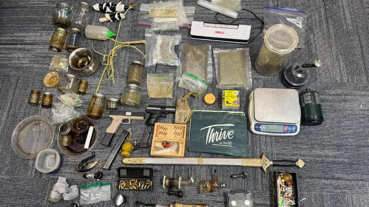 Items seized in a raid by agents with Iron-Garfield-Beaver Narcotics Task Force in Cedar City on Monday. Task force agents arrested a suspected drug dealer in Cedar City after they said they found these items in his possession.