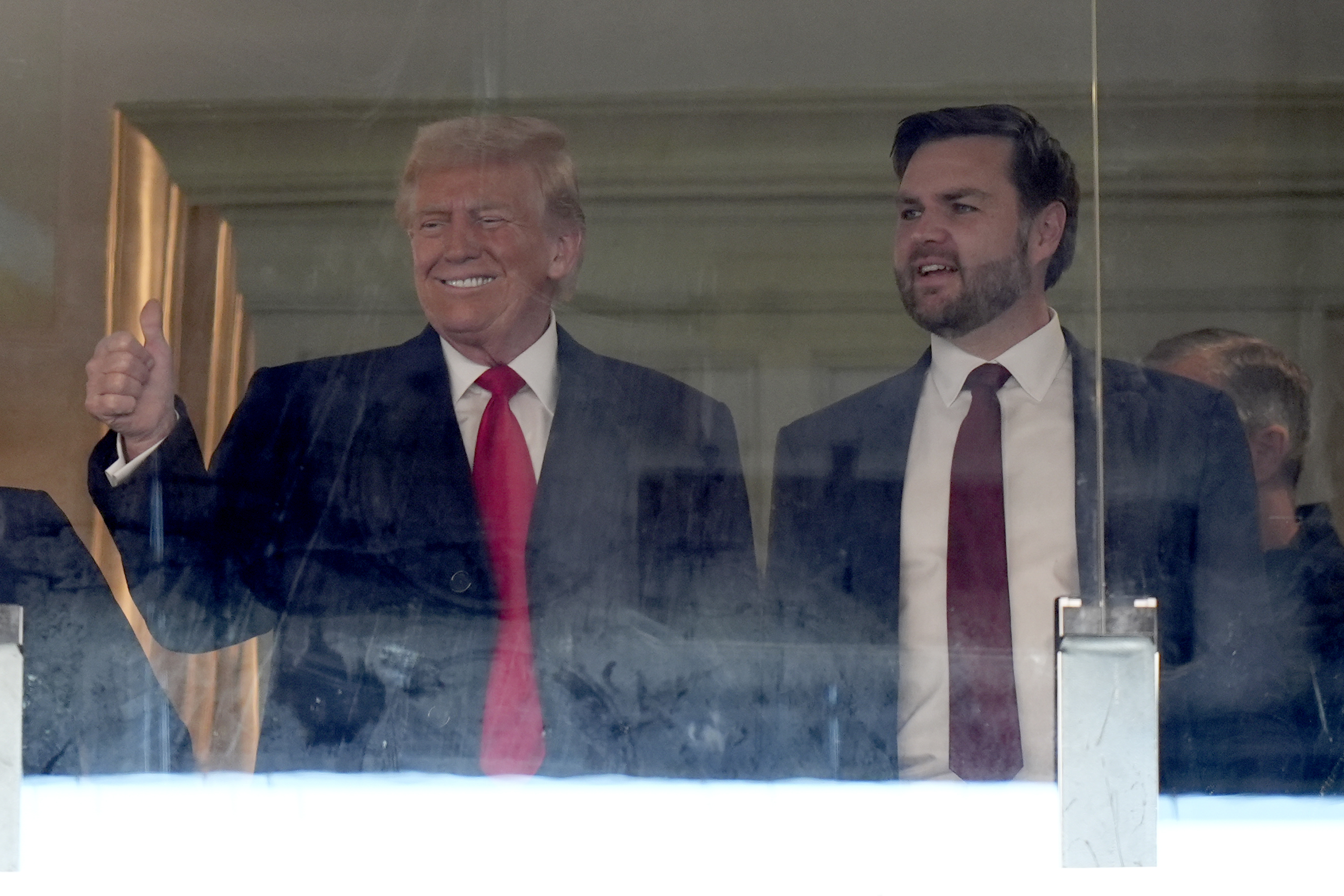 President-elect Donald Trump, left, and Vice President-elect JD Vance attend the 125th Army-Navy Game at Northwest Stadium in Landover, Md., Saturday.