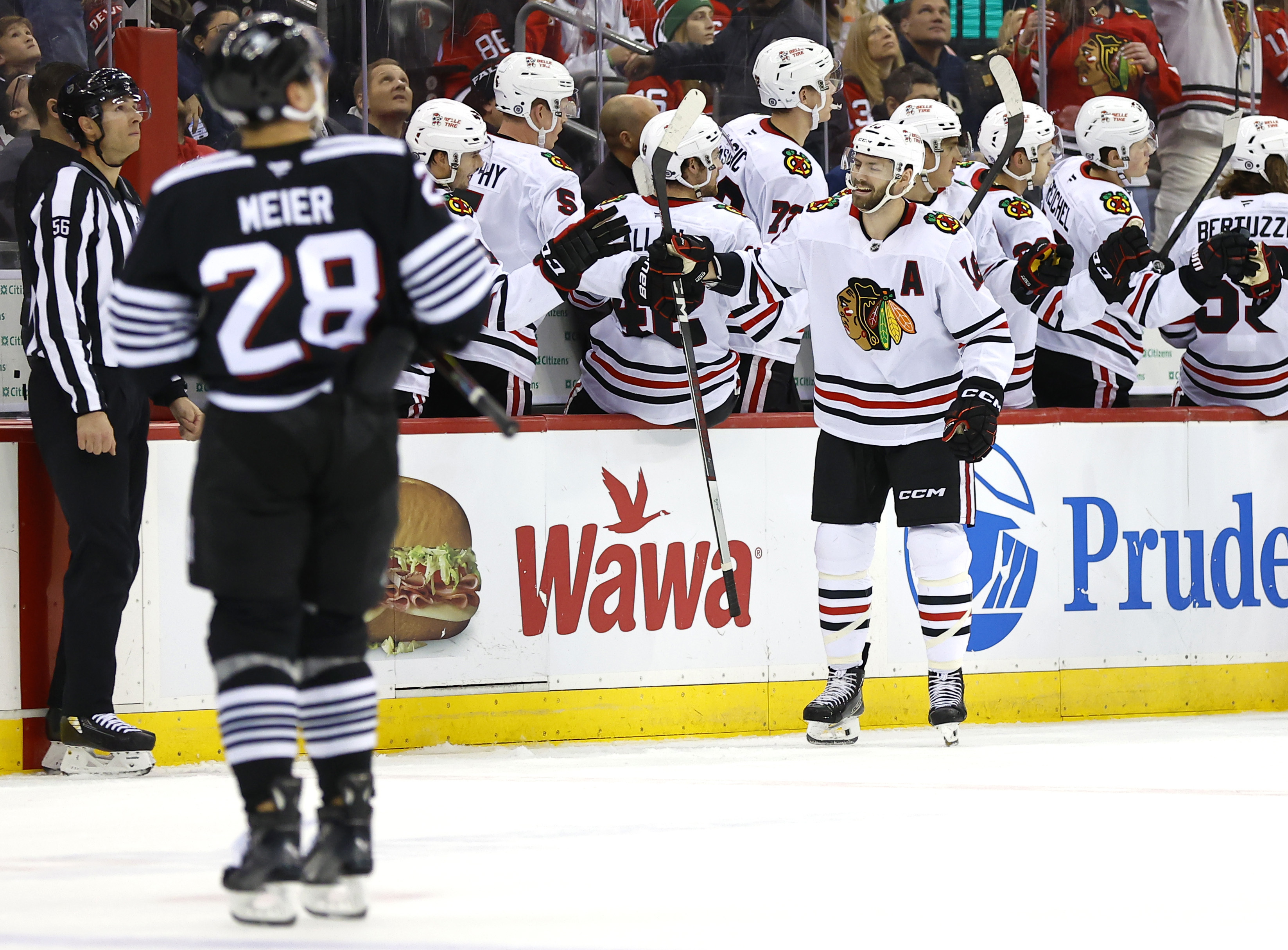 Jack Hughes helps the Devils rally for a 4-1 victory over the Blackhawks