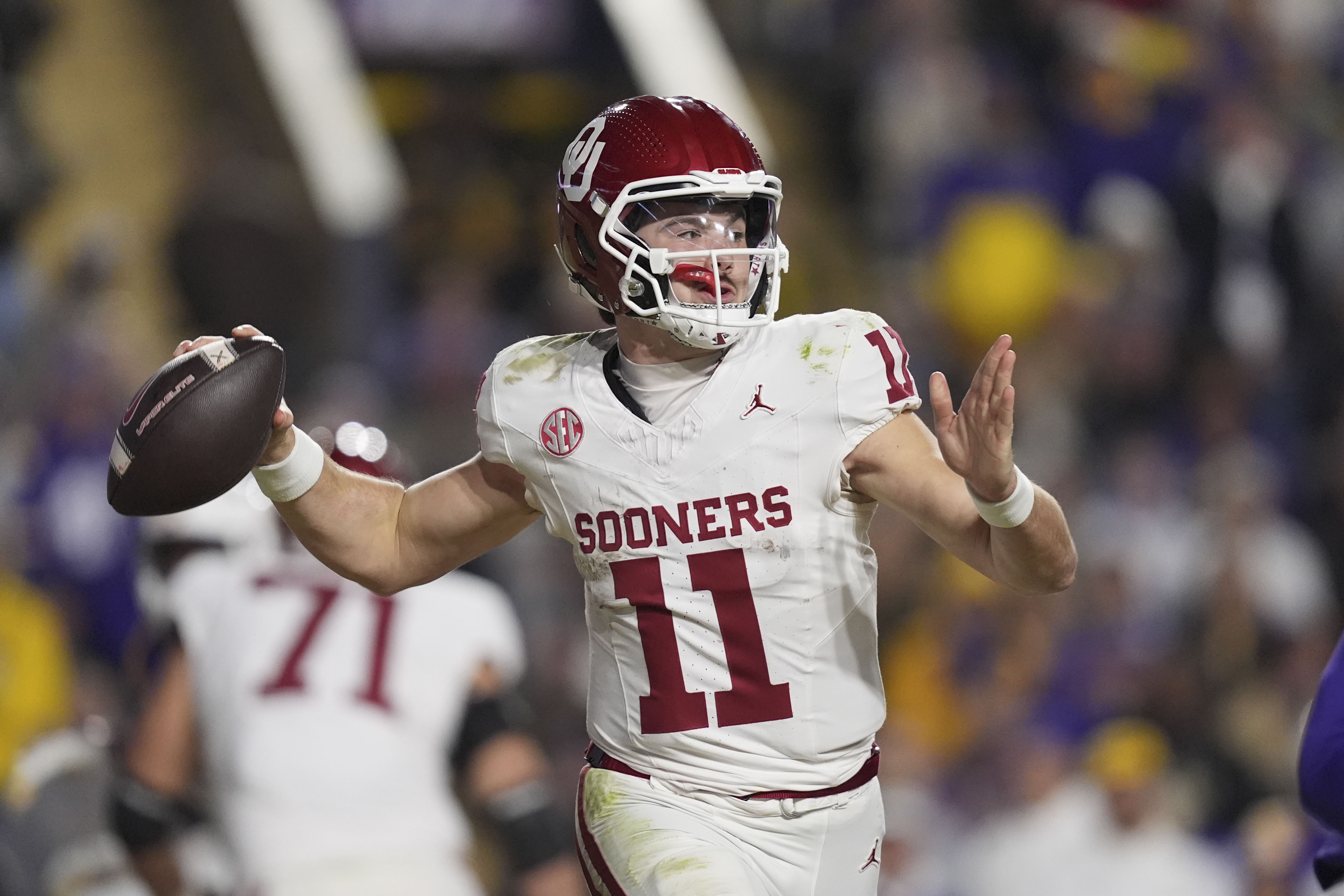 Oklahoma quarterback Jackson Arnold (11) passes in the second half an NCAA college football game against LSU in Baton Rouge, La., Saturday, Nov. 30, 2024. LSU won 37-17.