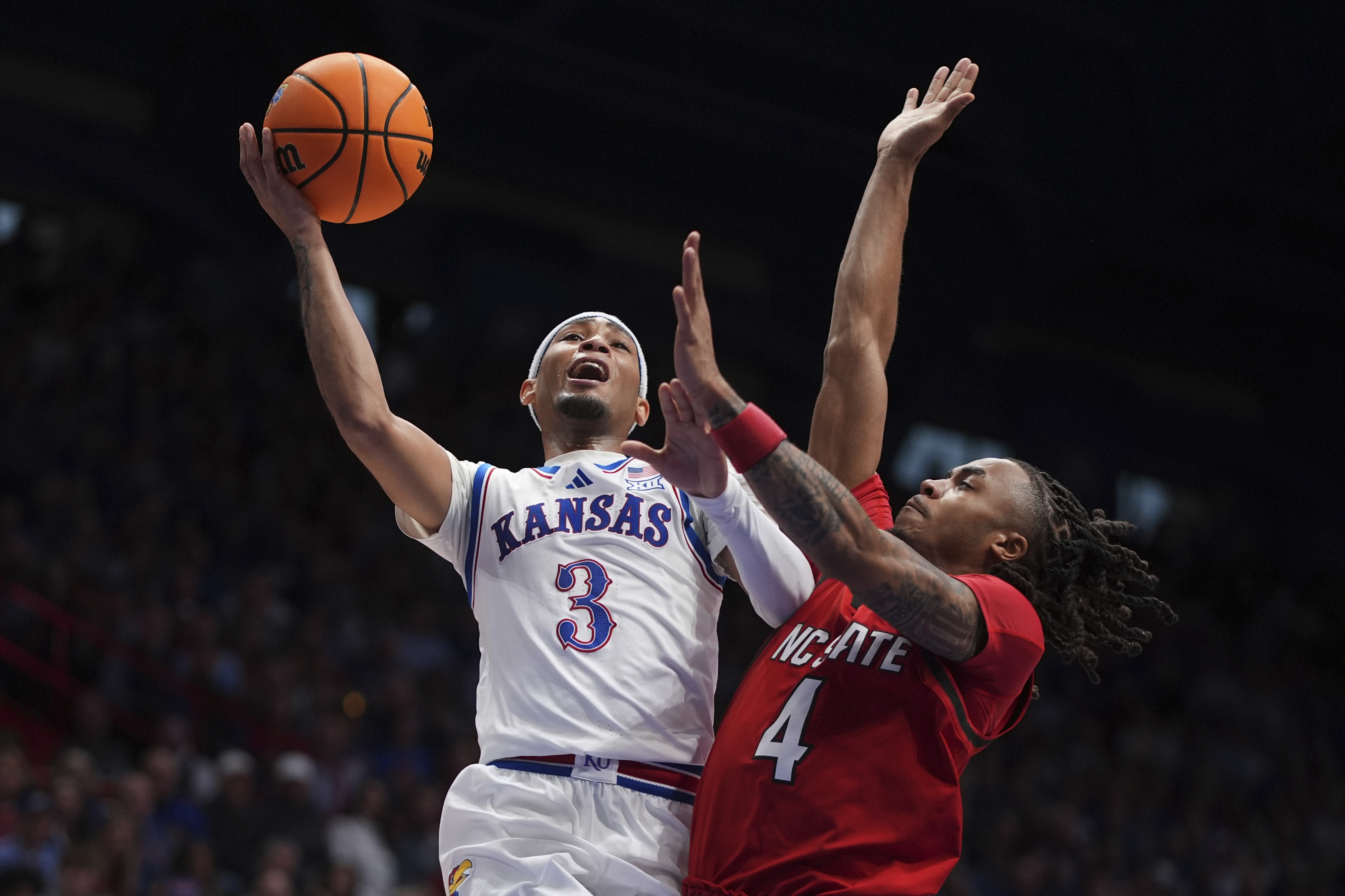 Mayo scores 26, Dickinson has 21 points and 14 boards as No. 10 KU beats NC State, 75-60