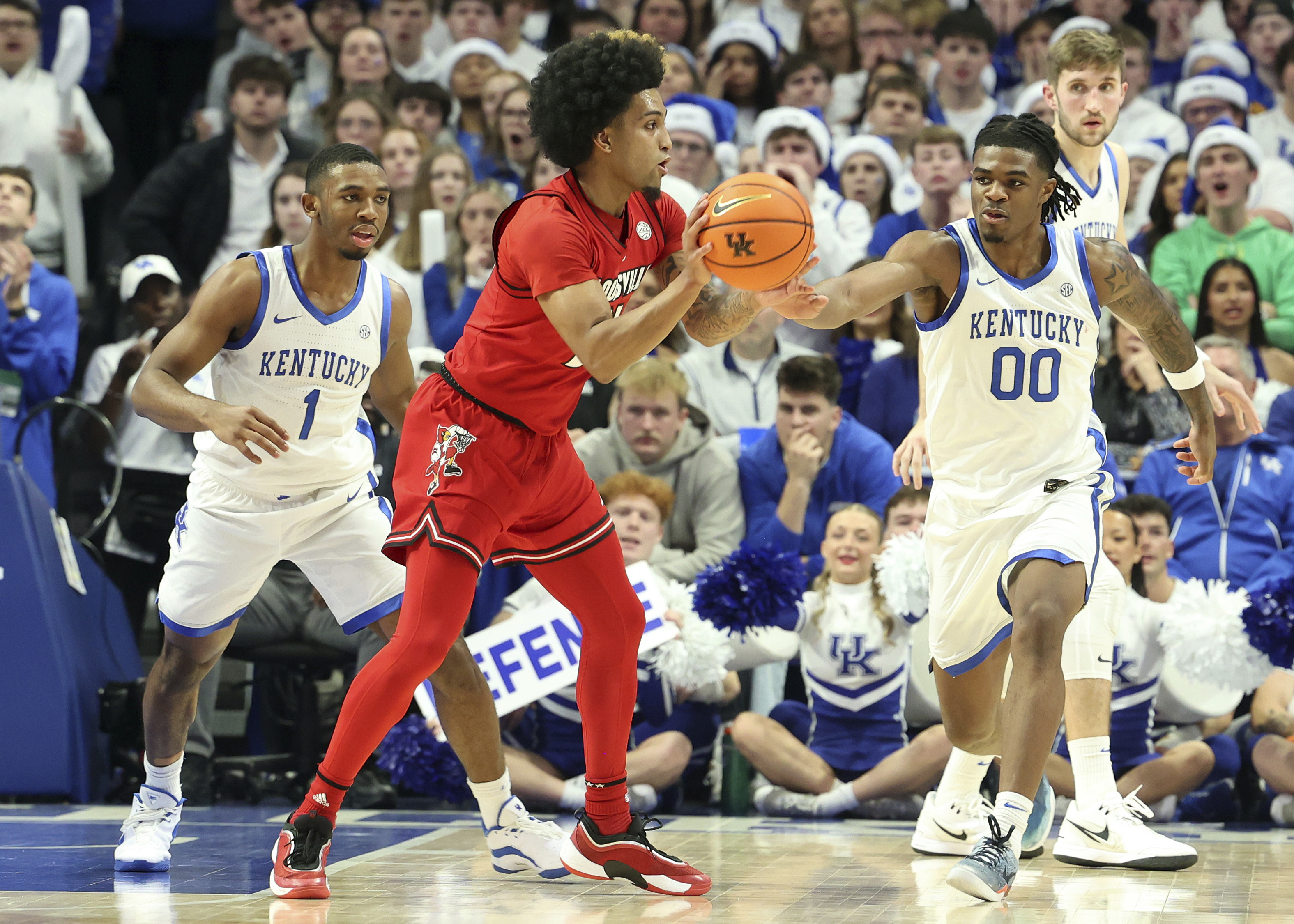 Lamont Butler scores career-high 33 points to help No. 5 Kentucky beat rival Louisville 93-85